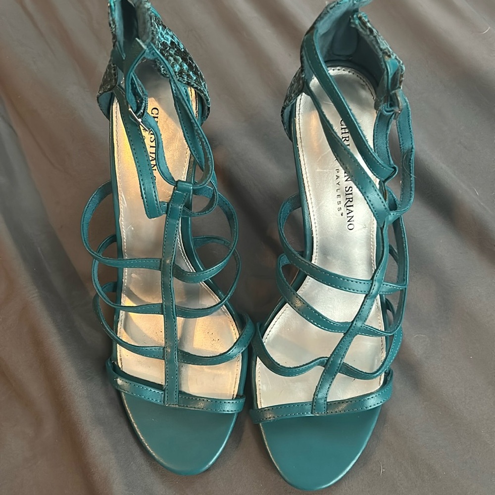 Teal colored women’s size 9 Christian Siriano heels 
With zipper in the back!